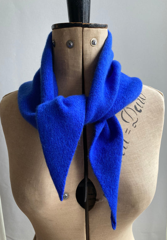 Cobalt blue neckerchief scarf tied on a mannequin.