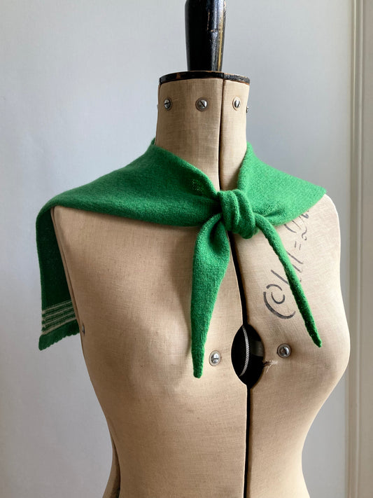 Bright green sailor collar scarf with white stripes shown on a mannequin.